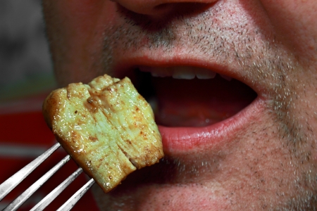 meat on a forkの写真素材