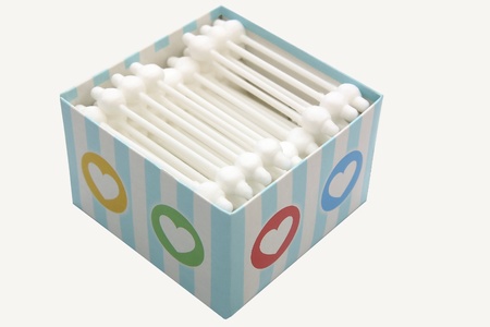 Pack of white cotton ears sticks isolated on white backgroundの写真素材