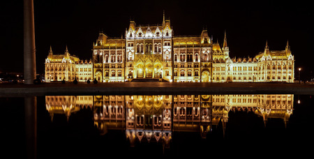 Illuminated Budapest Parliament in Hungary at night, view from the other unusual side, Europe.の写真素材