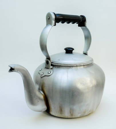 Classic old aluminum Kettle, isolated, white background