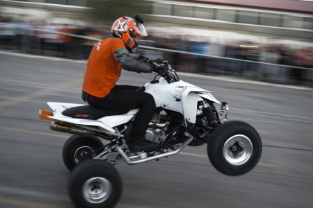 ALEXANDROUPOLIS, GREECE - OCTOBER 7  Motorcyclist in the Second Motor Beauty Contest Show, from the Stunt Xtreme Show Group, performing extreme stand  October 7, 2012 in Alexandroupolis, Evros, Greece のeditorial素材