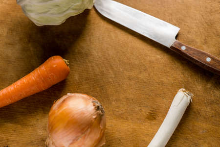 Wood grain background cooking supplies and vegetablesの写真素材