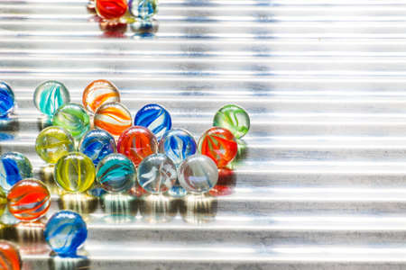 a marble rolling of wavy stainless steel