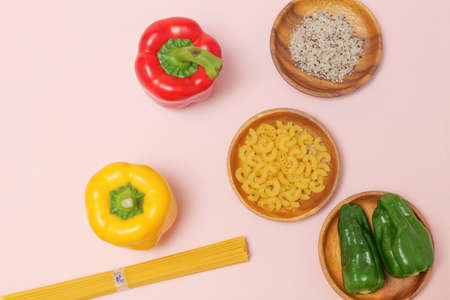Colorful ingredients with pink backgroundの写真素材