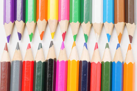 Colorful colored pencils placed on a white backgroundの写真素材