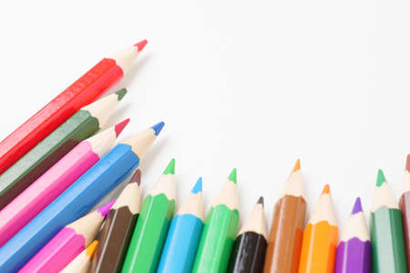 Colorful colored pencils placed on a white backgroundの写真素材