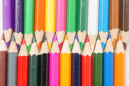 Colorful colored pencils placed on a white backgroundの写真素材