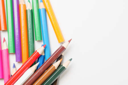 Colorful colored pencils placed on a white backgroundの写真素材