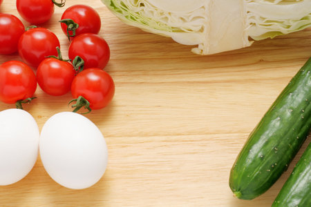 Cutting board with various ingredientsの写真素材