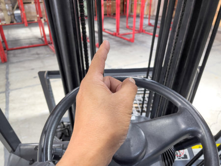 Male hand checking safety with a forkliftの写真素材