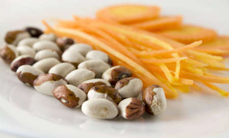 Carrot and the pea on the tableの写真素材