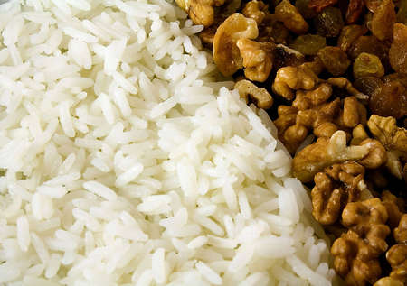The image contains rice, nuts and raisinの写真素材