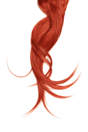 Red hair, isolated on white background. Long and disheveled ponytailの写真素材