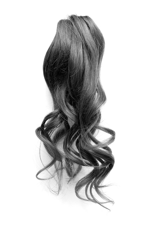 Natural curly black hair isolated on white backgroundの写真素材