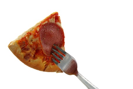 a piece of pizza skewered on fork isolated on white