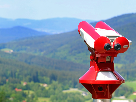 Red coin binoculars for tourists at viewpointの写真素材