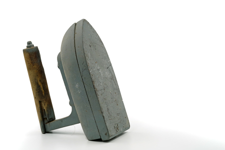 Old dusty iron isolated on white backgroundの写真素材