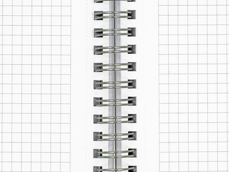 Close up of blank notebook with spiral in the middle for listing, copy space