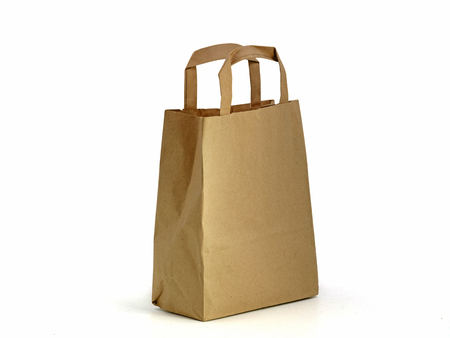 brown paper bag isolated on white background, avoid plastic bagsの写真素材