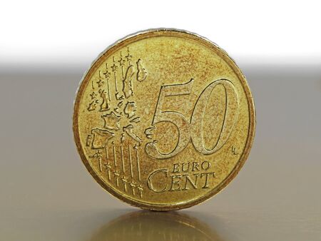 close up of fifty euro cent coin on table