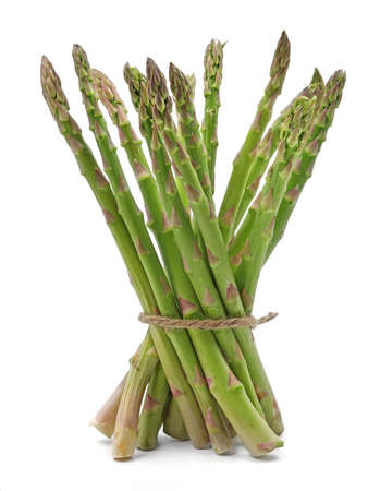 fresh asparagus wrapped with jute rope isolated on white backgroundの写真素材