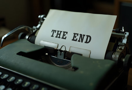 The end written on a vintage typewriter with shallow depth of fieldの素材