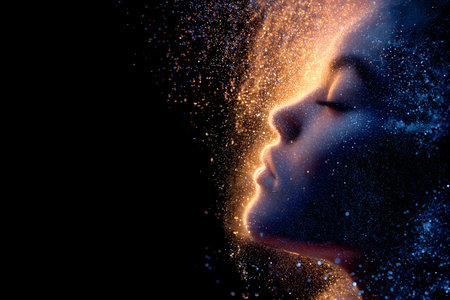 Portrait of a beautiful girl with closed eyes on a black backgroundの素材