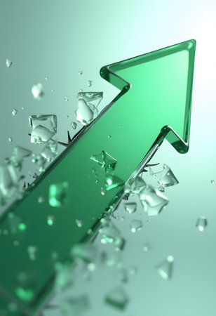 Green glass arrow breaking through a conceptual transparent barrier, symbolizing breakthrough and progressの素材