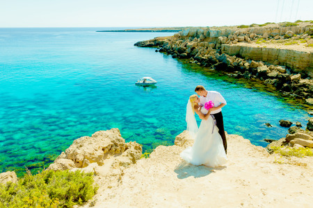 Maxim and Julia wedding photo shoot at seaの写真素材