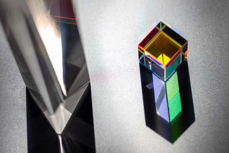 Colored square crystal with a rainbow on a substrate in close-upの写真素材