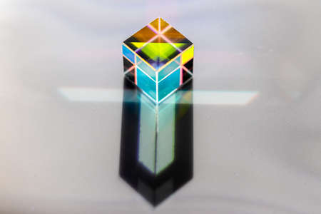 Colored square crystal with a rainbow on a substrate in close-upの写真素材