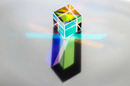 Colored square crystal with a rainbow on a substrate in close-upの写真素材