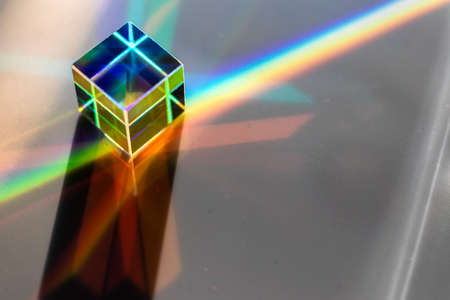 Colored square crystal with a rainbow on a substrate in close-upの写真素材