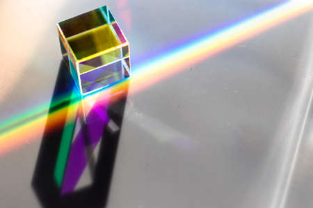 Colored square crystal with a rainbow on a substrate in close-upの写真素材