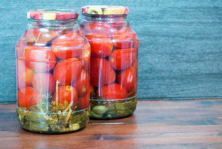 Canned tomatoes pickle in jarの写真素材