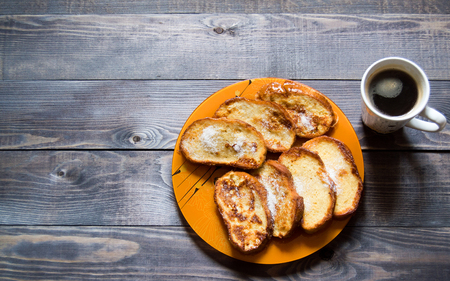 TOASTES AND COFFEE ON THE TABLEの写真素材