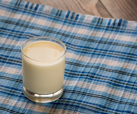 milk on tableclothの写真素材