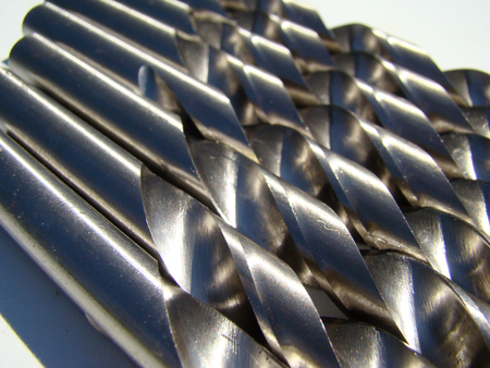 drill bit-cutting tool with rotational cutting movement.