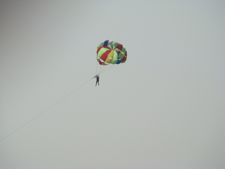 parachute in the open state in the skyの写真素材