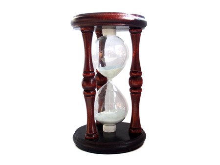 hourglass closeup on white background,time