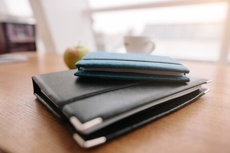 Two notepads lie on the table.の写真素材