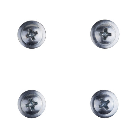 Four screw heads of silver color with path for the cross screw-driverの写真素材