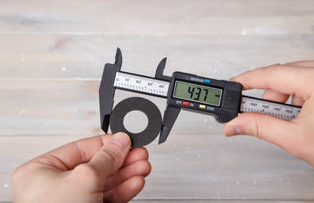 Measurement of the diameter of the rubber gasket with a caliperの写真素材