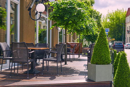 Empty tables of a summer cafe in the city center in Vilniusの写真素材