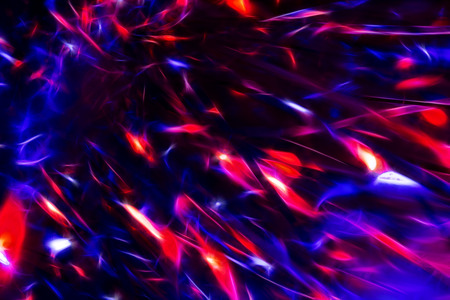Abstract background with blue and red colors with chaotically located colored lightsの写真素材