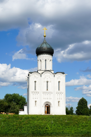 the ancient Church "Pokrova na Nerli" in the summer. The Golden Ring Of Russia. Historical attractions and architecture of Russia.の写真素材