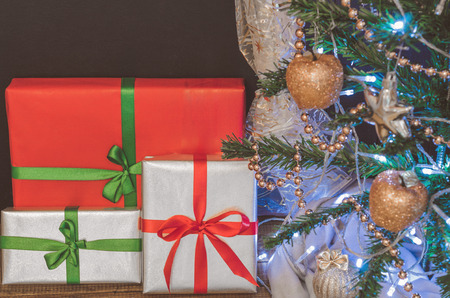 Christmas tree, toys and gifts, free space for text.の写真素材