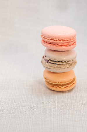 Delicious cake macaroons on light background, close upの写真素材
