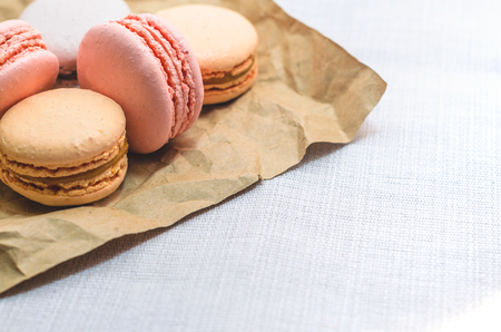 Appetizing cakes macaroons in the package close upの写真素材