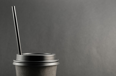 Closed Coffee Cup on black backgroundの写真素材